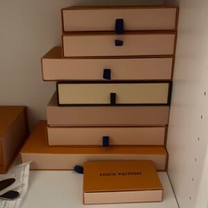 Any size Luis vuitton wallet box and dust bags let me know what interests you